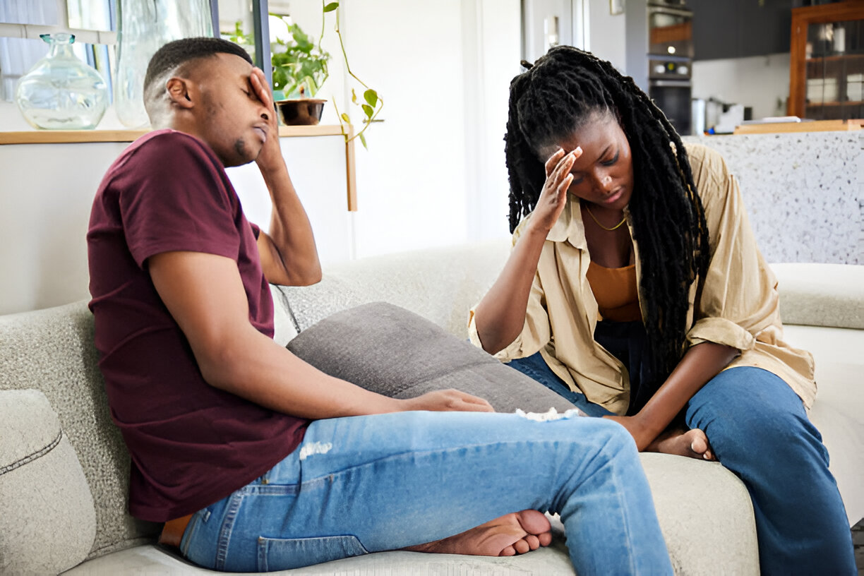 Unhappy young couple arguing with each other at home stock photo in Love vs. Lust article by Xhale NG